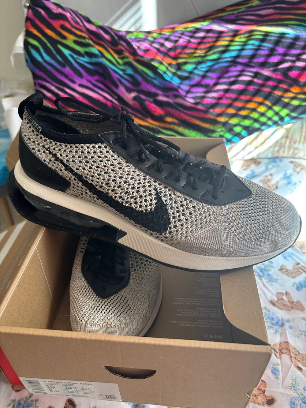Nike Men’s Black and White Flyknit Sneaker with Air Cushion